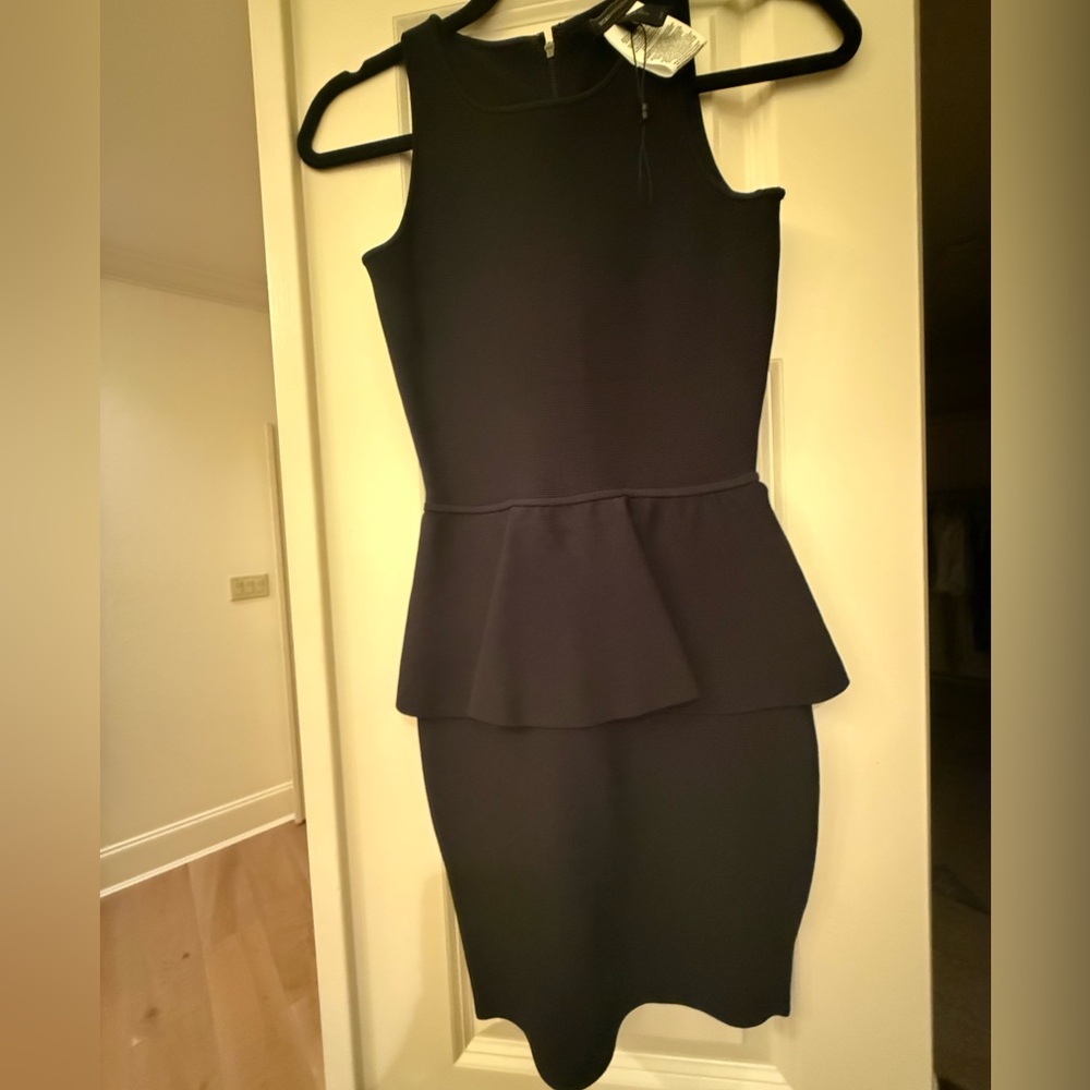 BCBGMaxAzria Size Small Classic Black Sleeveless Peplum Dress